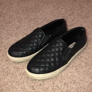 Black Steve Madden slip ons